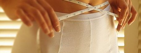 457px-Woman_Measuring_Waist