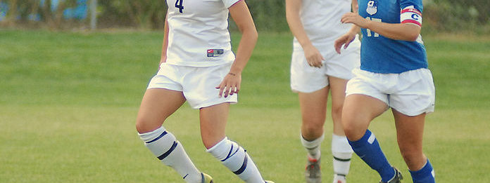 696px-Girls_playing_Soccer